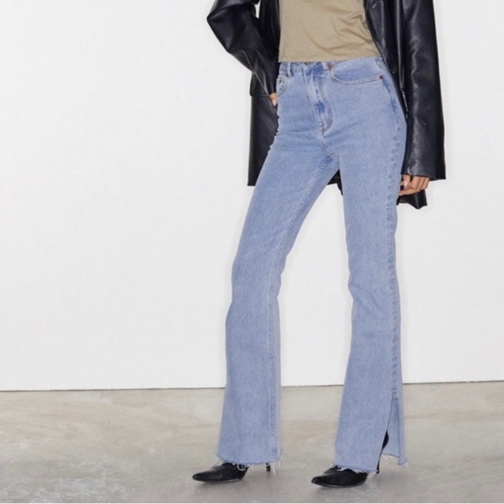 Light wash bootleg split jeans